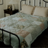 green patterned quilt
