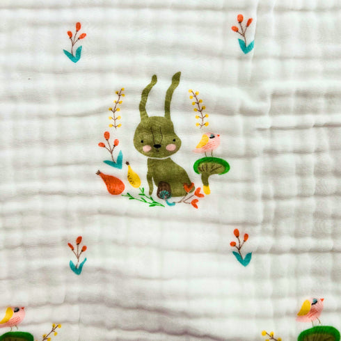 Manta envolvente para bebé con encantador estampado de conejito y pájaro, color crema con ribete verde | 100 % algodón | 109 x 109 cm