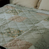 green detailed quilt