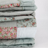 green quilt detail
