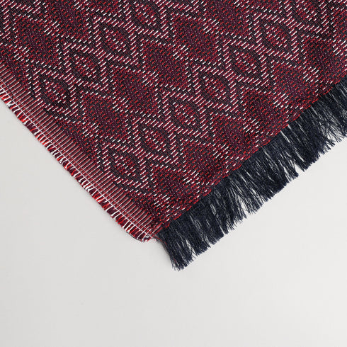 Maroon jacquard geometric patterned throw blanket with fringe