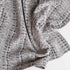 jacquard boucle folded throw blanket designer black and white textured
