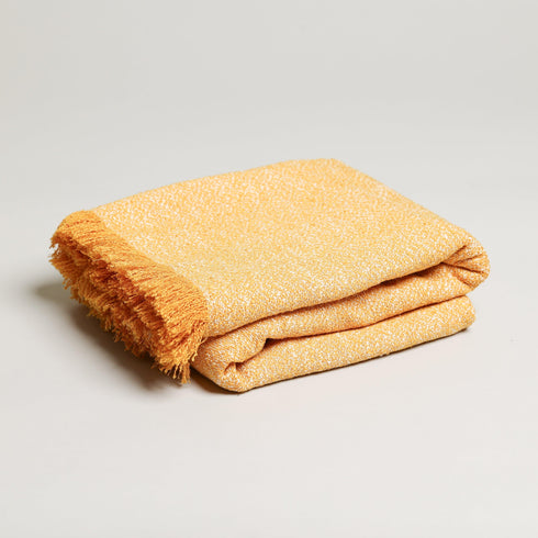 folded yellow with white boucle fabric weave jacquard throw blanket