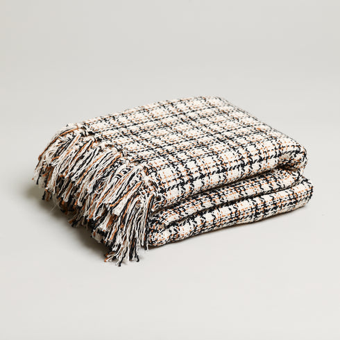 boucle's folded khaki white and black plaid throw blanket with tassels