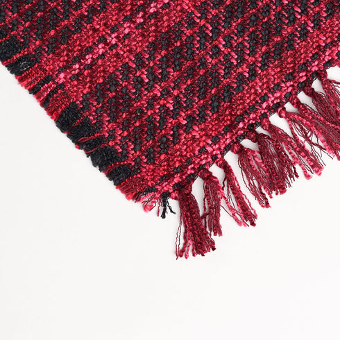 magenta blanket with tassels