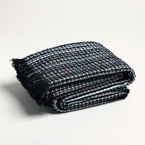 folded holiday multicolor throw blanket with 1.5 inch fringe
