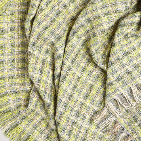 spring colored tweed fancy throw blanket twisted to show texture and pattern
