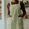 green apron with white stripes