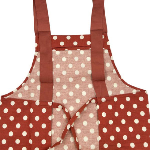 back of red apron with white polka dots