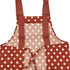back of red apron with white polka dots