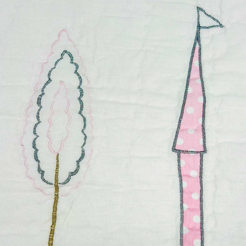 close up of tree and castle baby blanket