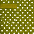 close up view of green apron with white polka dots