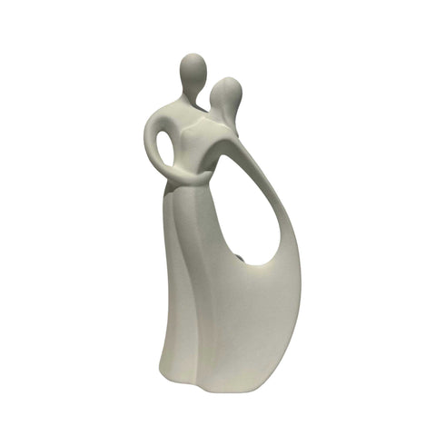 loving dancing white ceramic couple statues