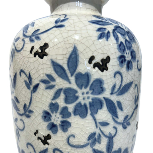 this is a detailed image of a porcelain flower vase with decorative living room decor