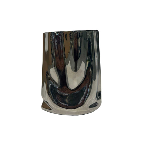 small ceramic vase with detailed ruffles for flowers