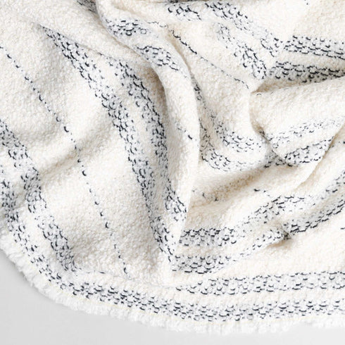 soft acrylic throw blanket with white and cream and a black tweed