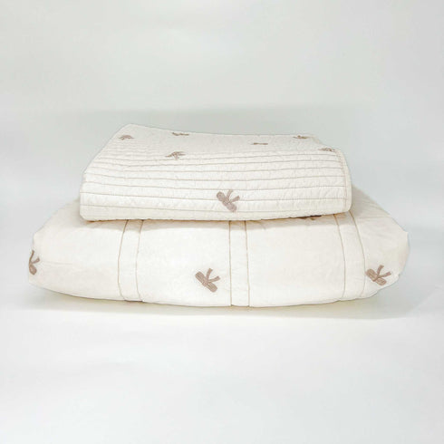 white nursery set with bows