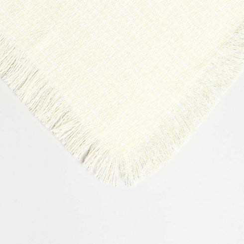 light yellow fringed throw blanket image  styled to show the weave texture and colors